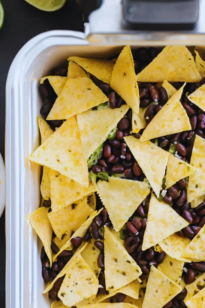 Layered nachos in air fryer basket